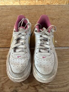 Nike White Sneakers with Pink Lining and Gold Swoosh